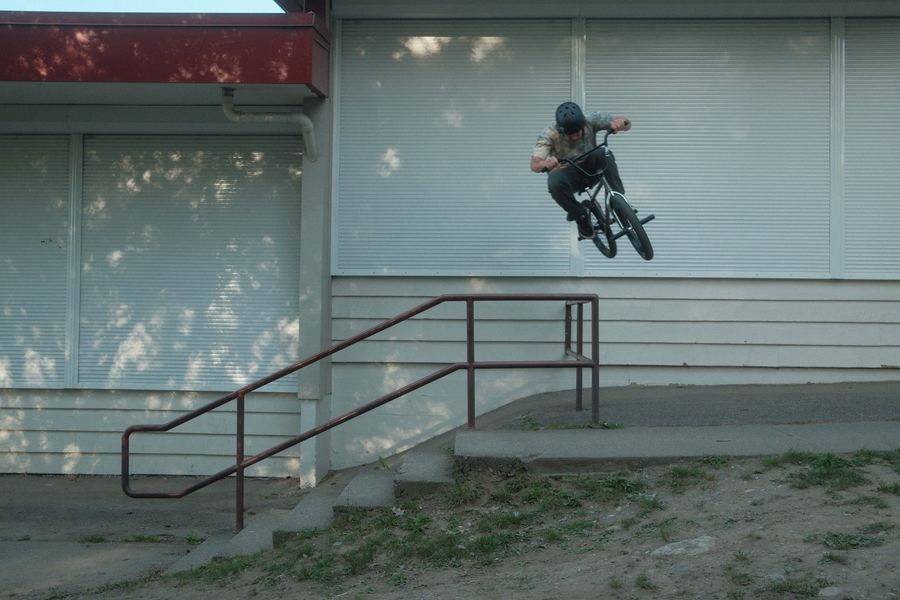 BMX rider over the rail