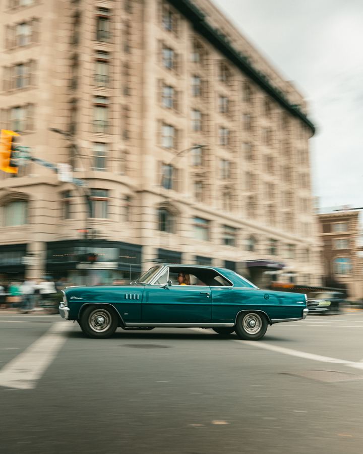 Classic coupe on a city street