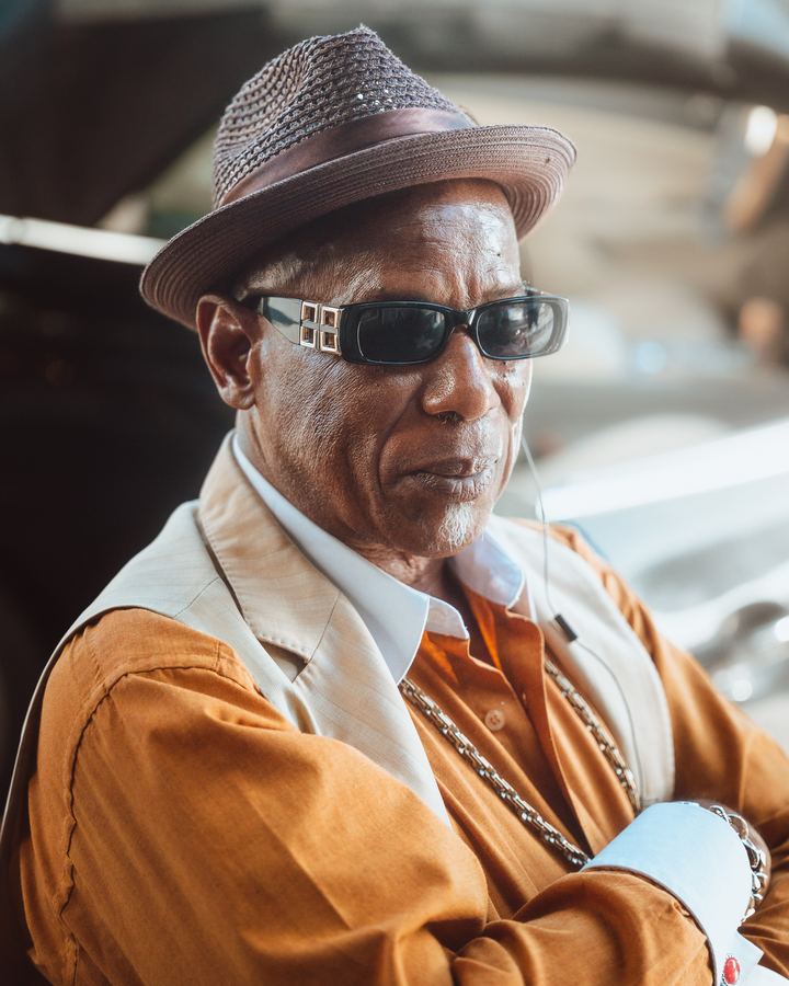 Portrait in a hat and shades