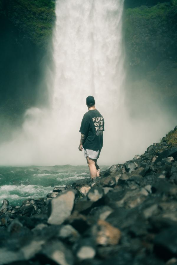 Standing under the falls