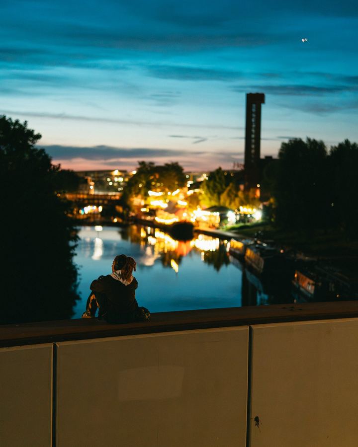 River at dusk, city lights